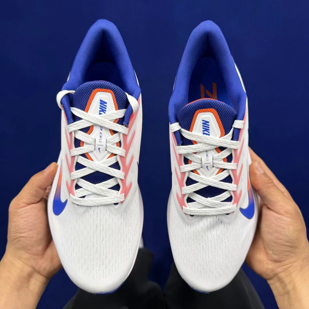 Nike Zoom Winflo in White/Blue/Red: Chromatic Propulsion
