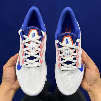 Nike Zoom Winflo in White/Blue/Red: Chromatic Propulsion