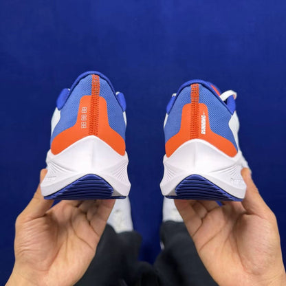 Nike Zoom Winflo in White/Blue/Red: Chromatic Propulsion