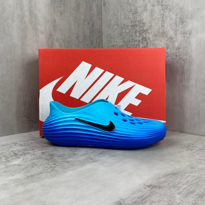 Nike ReactX Rejuvenation Slides in Blue: Aqua-Coded Recovery