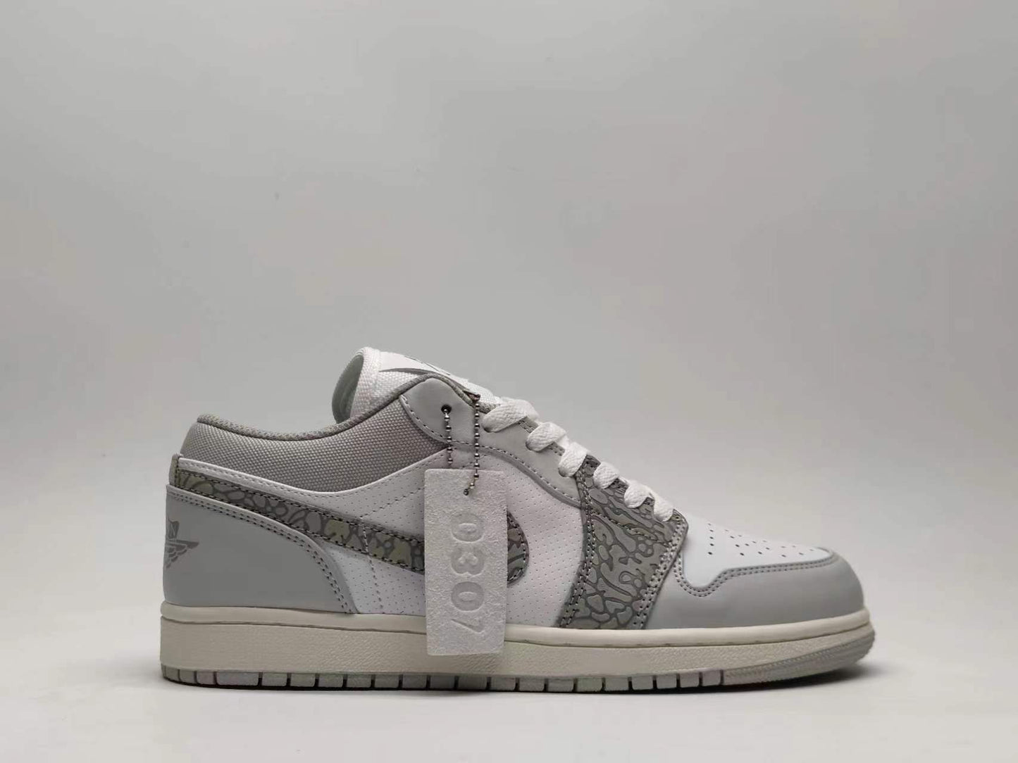 Air Jordan 1 Low “Grey White Elephant Print”
