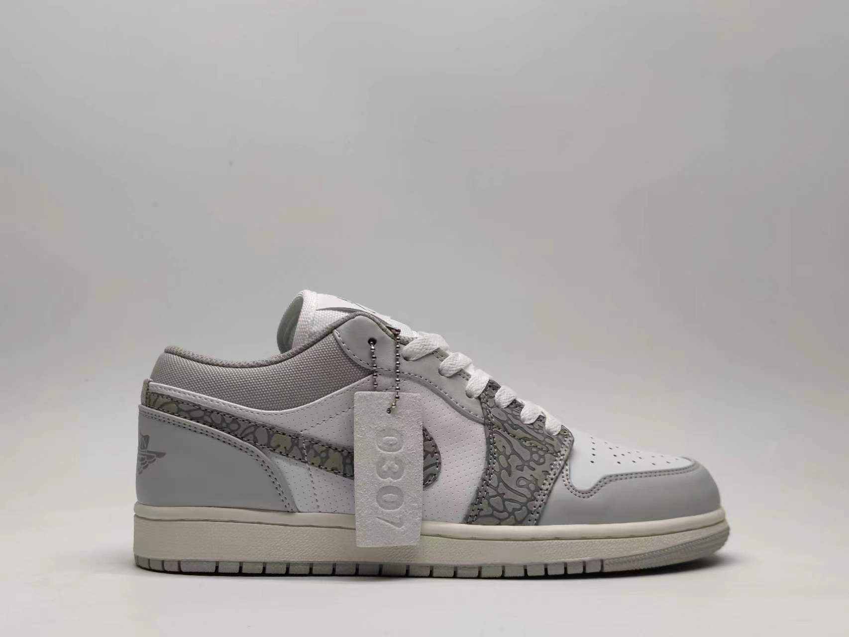 Air Jordan 1 Low “Grey White Elephant Print”