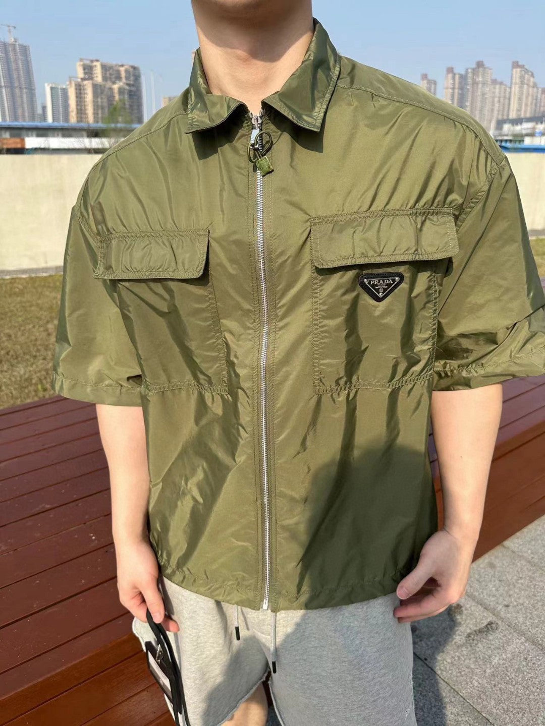 Pra*a olive green short-sleeve jacket