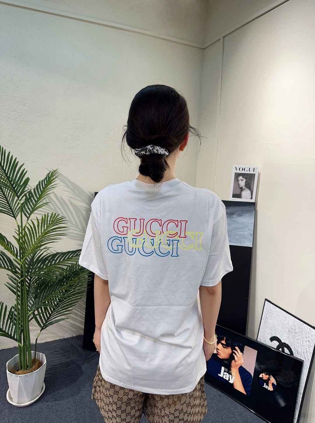 G*u*i white t-shirt with blue vertical logo patch