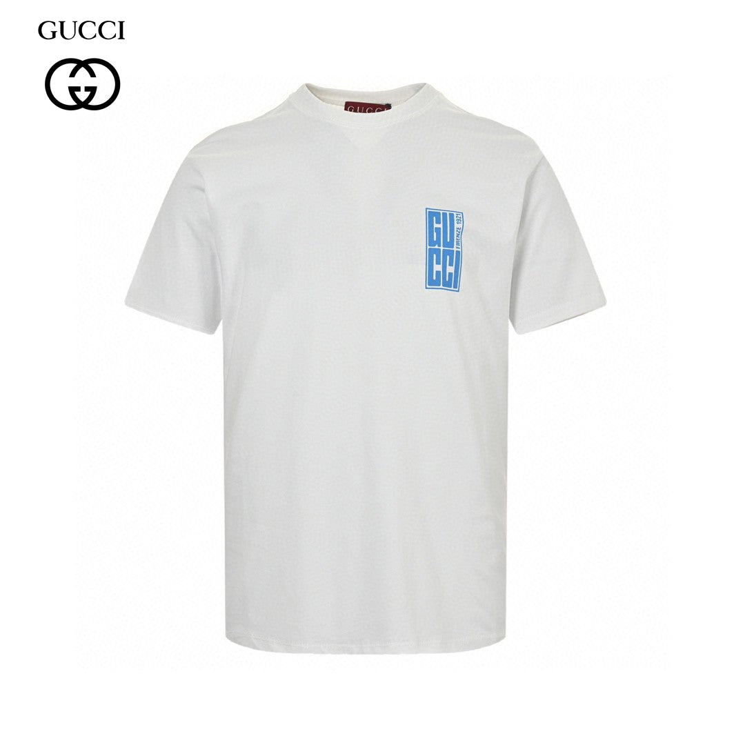 G*u*i white t-shirt with blue vertical logo patch