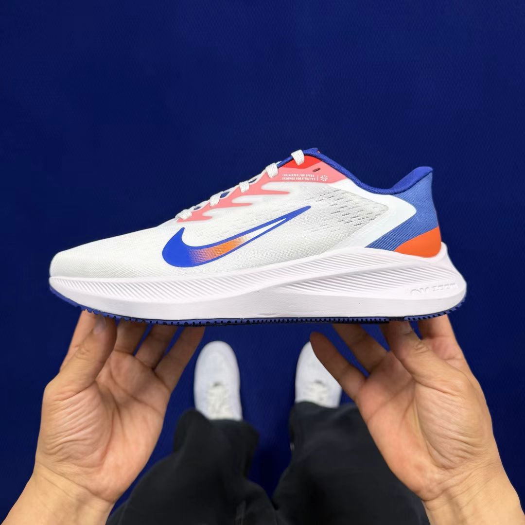 Nike Zoom Winflo in White/Blue/Red: Chromatic Propulsion