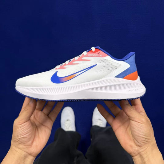Nike Zoom Winflo in White/Blue/Red: Chromatic Propulsion