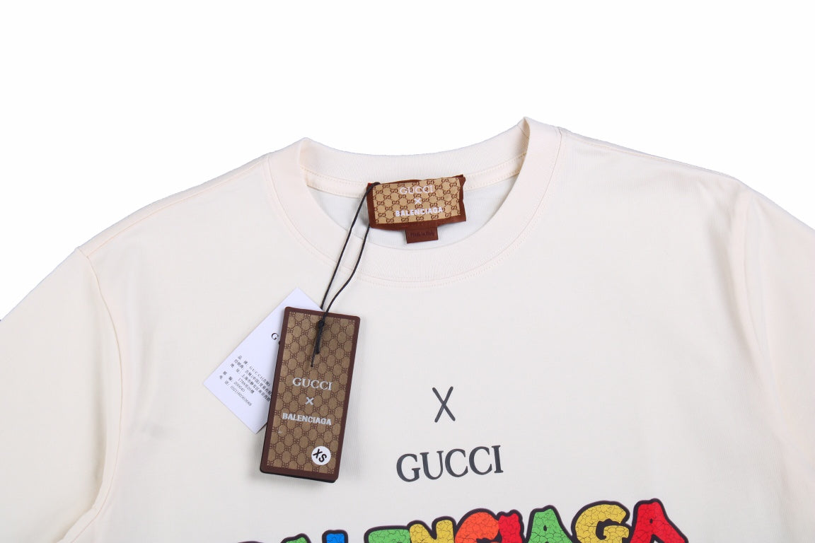 g*u*i x Ba*len*cia*ga drip logo t-shirt (cream)