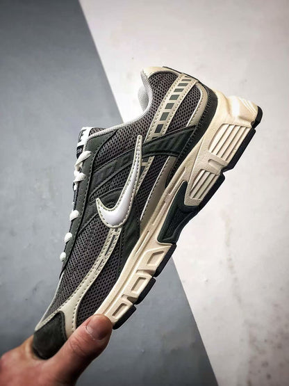 Nike Initiator in Dark Green: Grounded Heritage