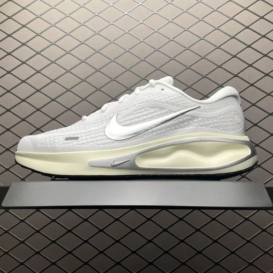 Nike Sneaker in White/Silver: Metallic Luminescence