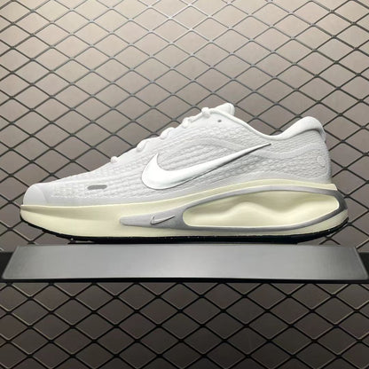 Nike Sneaker in White/Silver: Metallic Luminescence