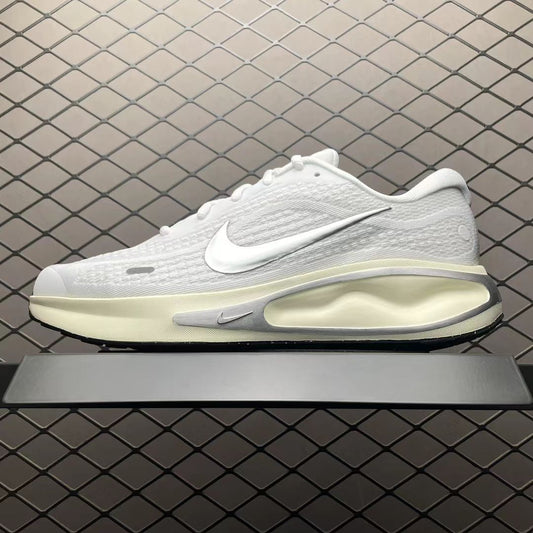Nike Sneaker in White/Silver: Metallic Luminescence
