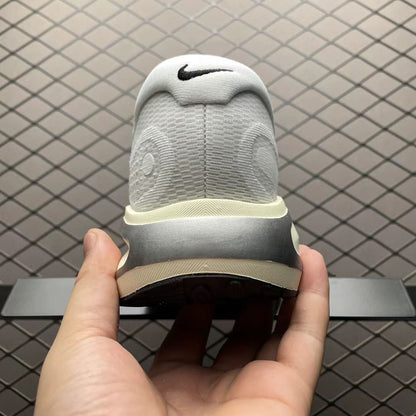 Nike Sneaker in White/Silver: Metallic Luminescence