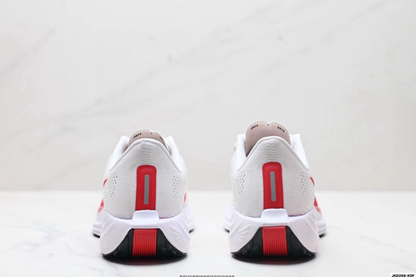 Nike Zoom Sneaker in White/Red: Ignited Velocity