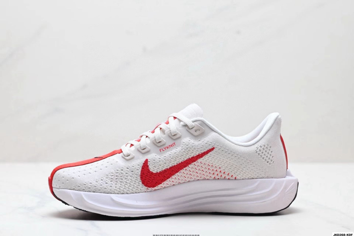 Nike Zoom Sneaker in White/Red: Ignited Velocity