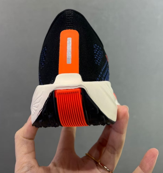 Nike Zoom Sneaker in Blue/Orange: Chromatic Propulsion