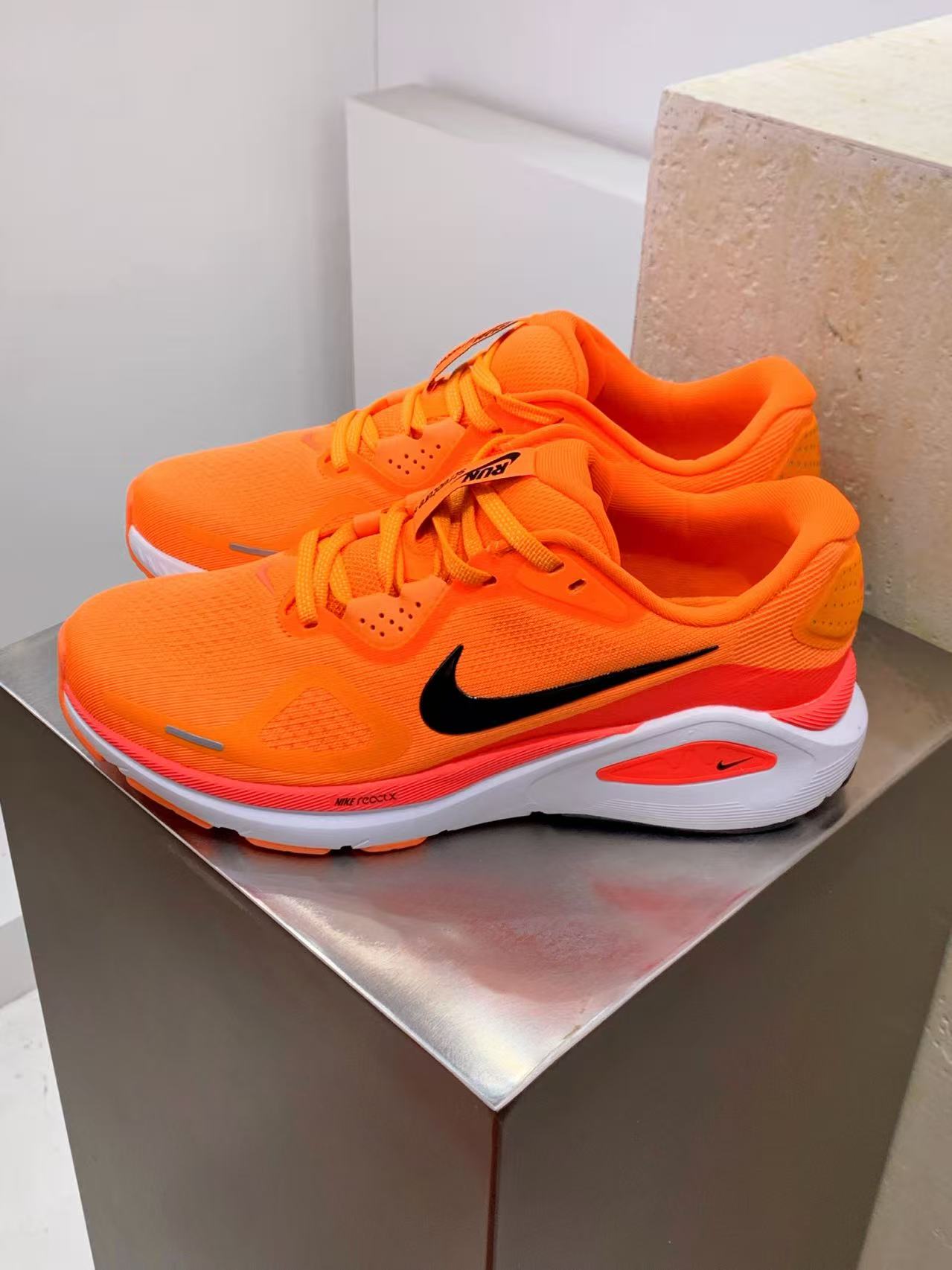 Nike Zoom Sneaker in Orange/White: Solar Surge