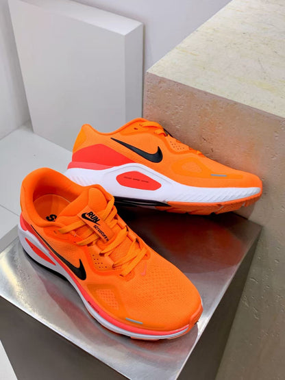 Nike Zoom Sneaker in Orange/White: Solar Surge