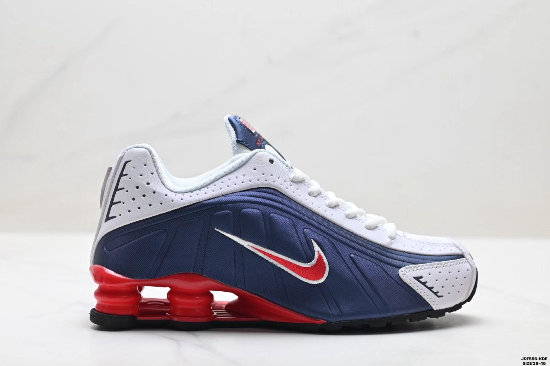 Nike Shox R4 in Blue/White/Red: Futuristic Retro