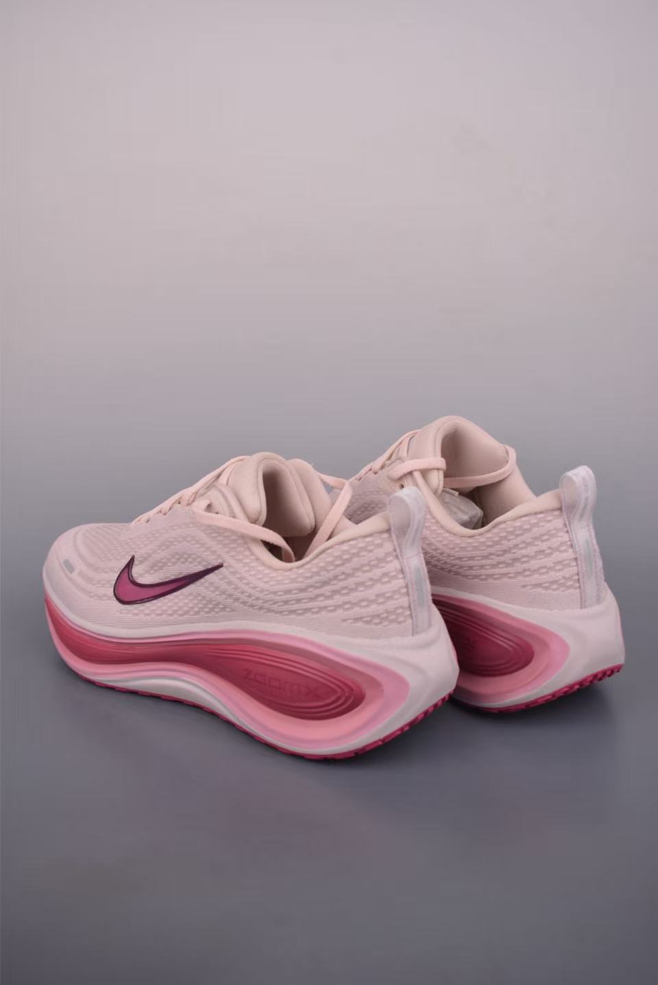 Nike Zoom Vomero in Grey/Pink: Metropolitan Serenity