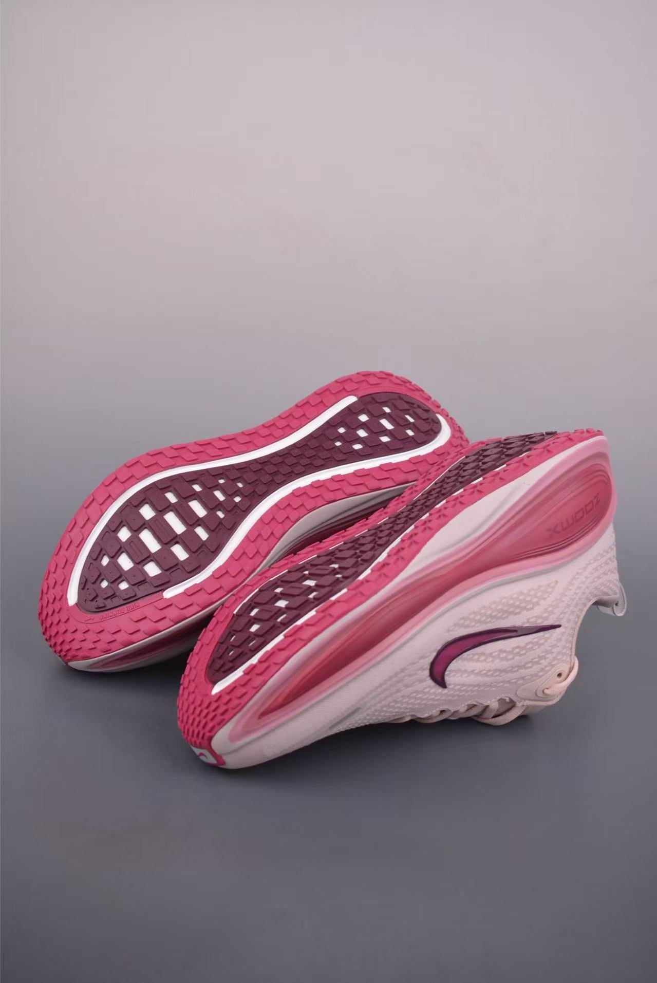 Nike Zoom Vomero in Grey/Pink: Metropolitan Serenity
