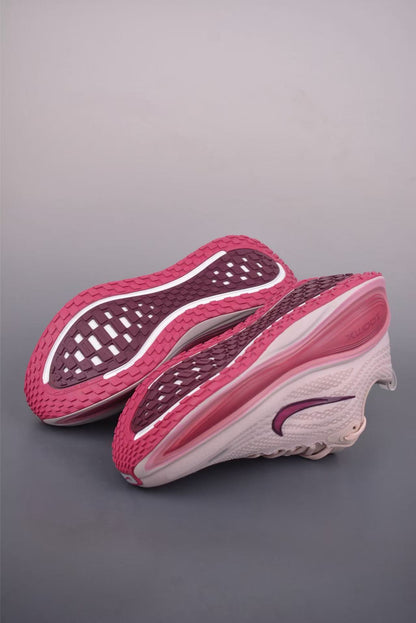 Nike Zoom Vomero in Grey/Pink: Metropolitan Serenity