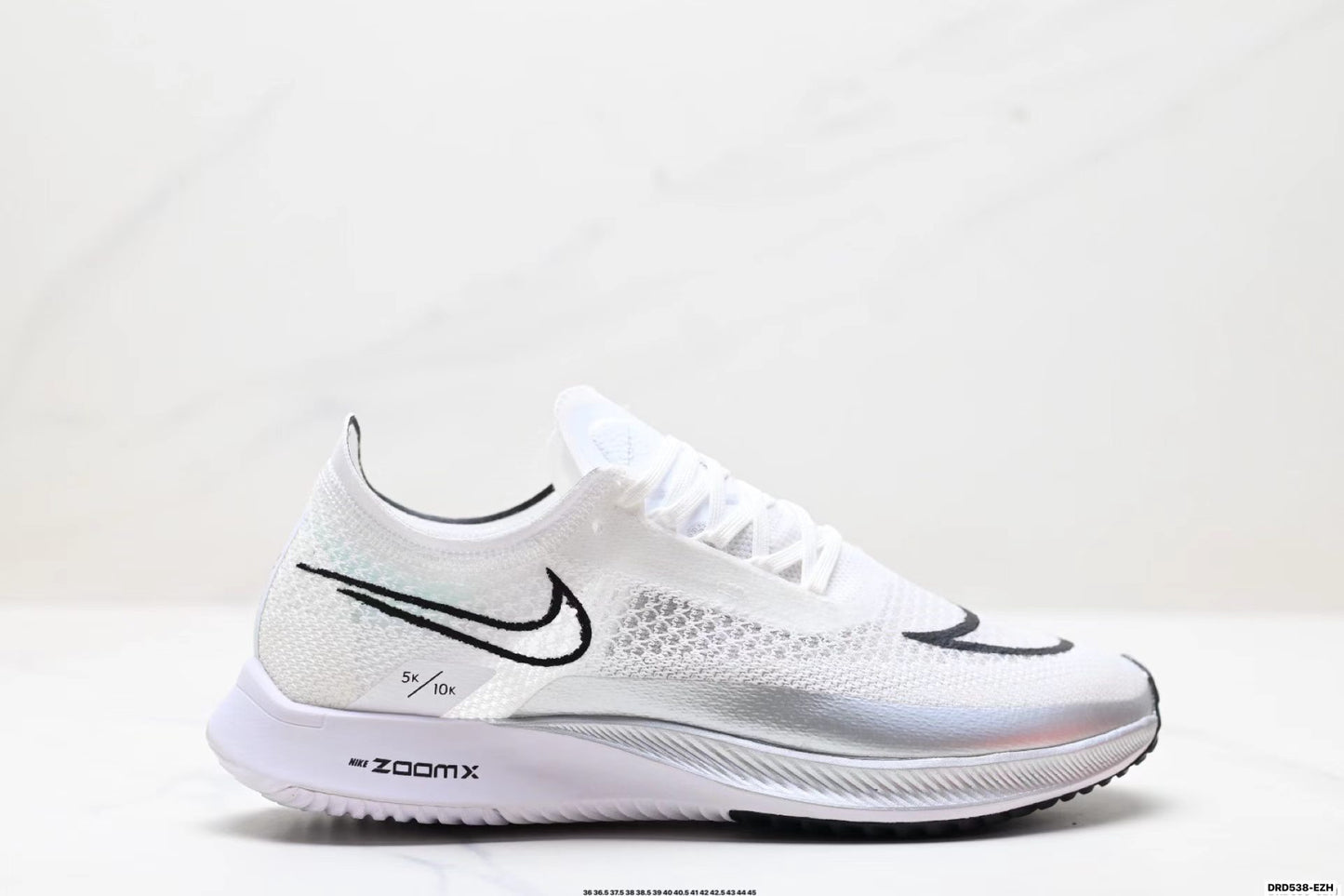 Nike ZoomX Streakfly in White/Black: Minimalist Missile