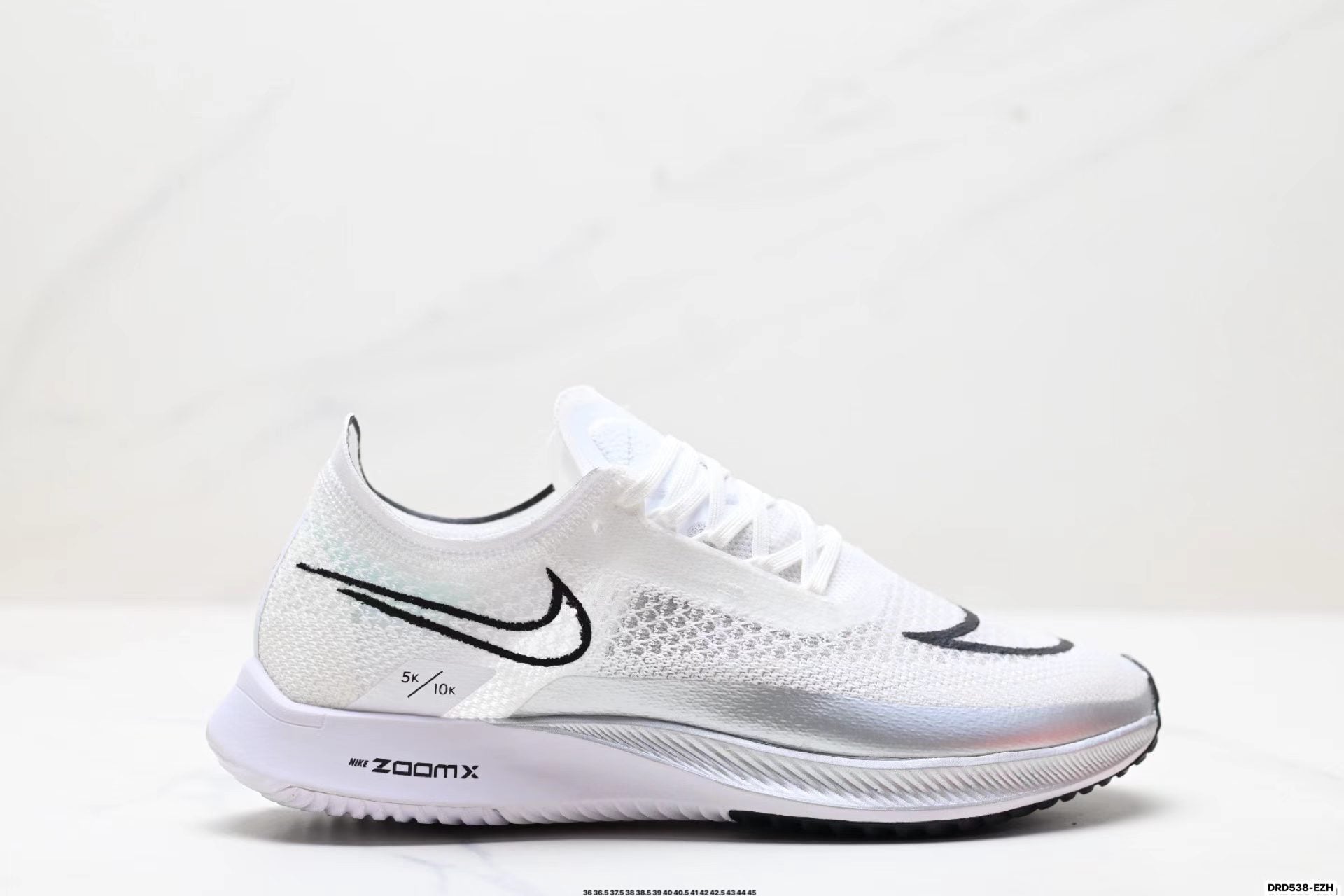 Nike ZoomX Streakfly in White/Black: Minimalist Missile
