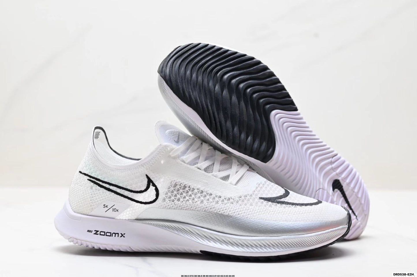 Nike ZoomX Streakfly in White/Black: Minimalist Missile
