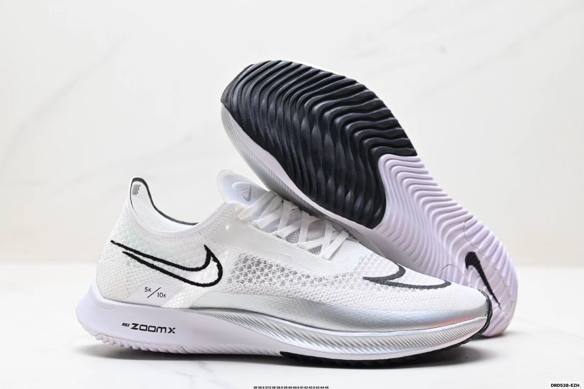 Nike ZoomX Streakfly in White/Black: Minimalist Missile