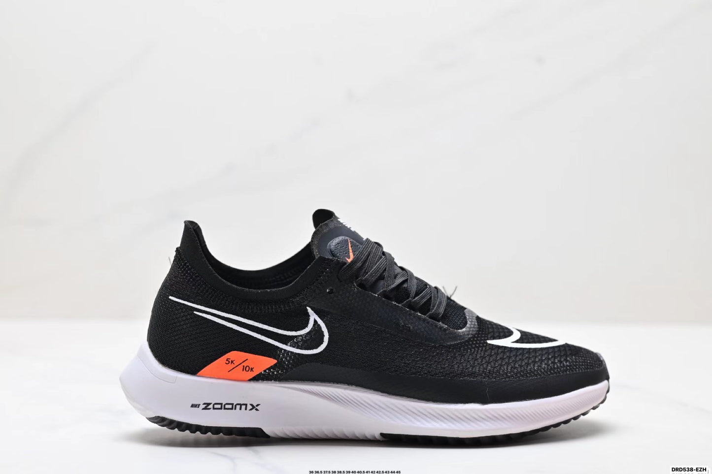 Nike ZoomX Streakfly in Black/White: Inverted Velocity