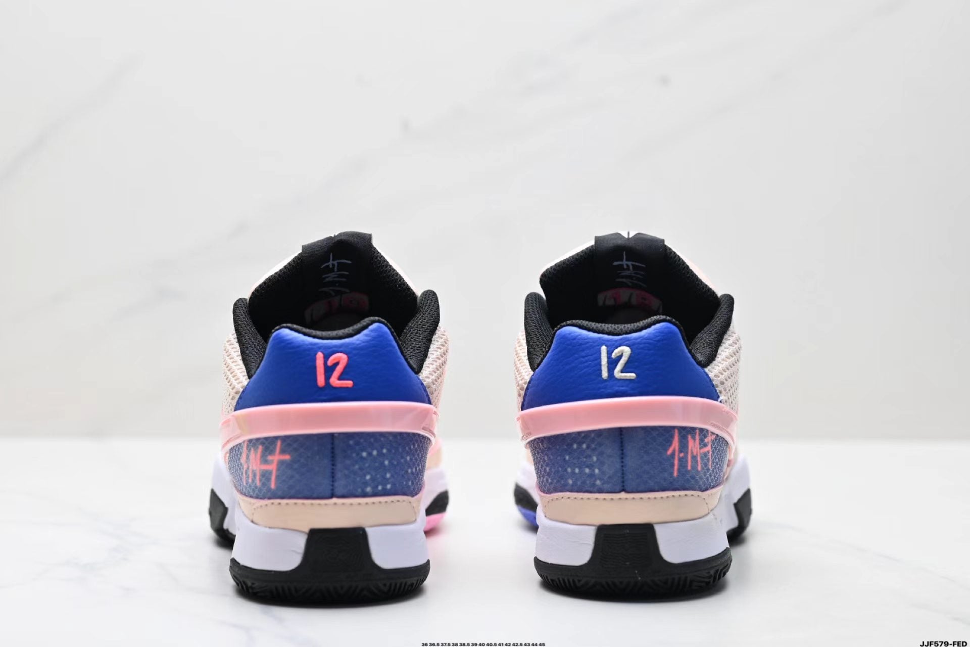 Nike Ja 1 in Pink/Blue: Playful Precision