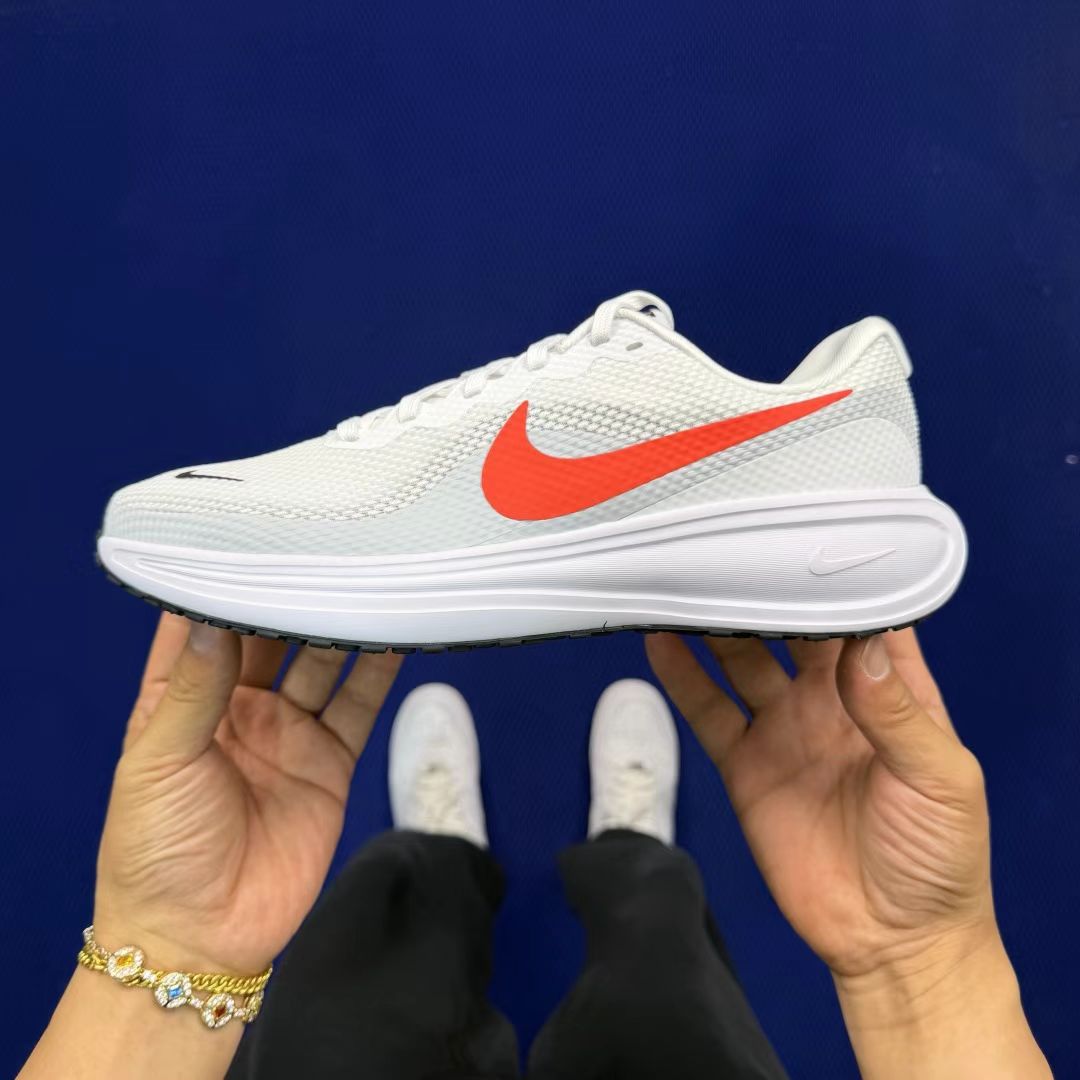 Nike Revolution 7 in White with Red Tab: Essential Contrast
