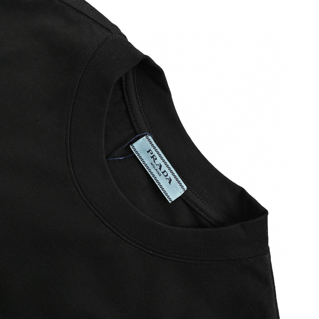 Pra*a black t-shirt with geometric pocket design