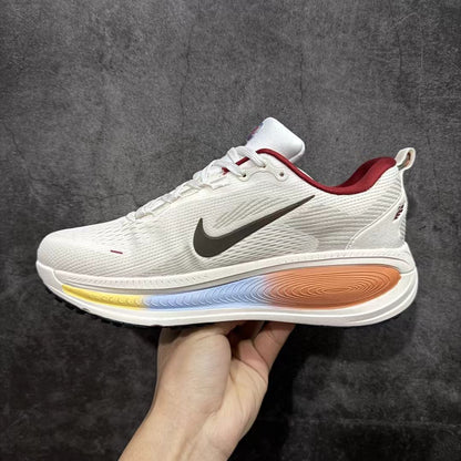 Nike Zoom Vomero in Yellow/Blue/Brown: Earthbound Sunrise