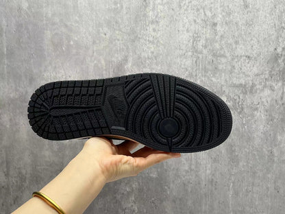 Air Jordan 1 Low "Black/Sail Reverse Swoosh"
