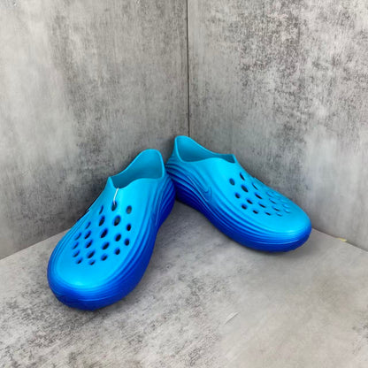 Nike ReactX Rejuvenation Slides in Blue: Aqua-Coded Recovery