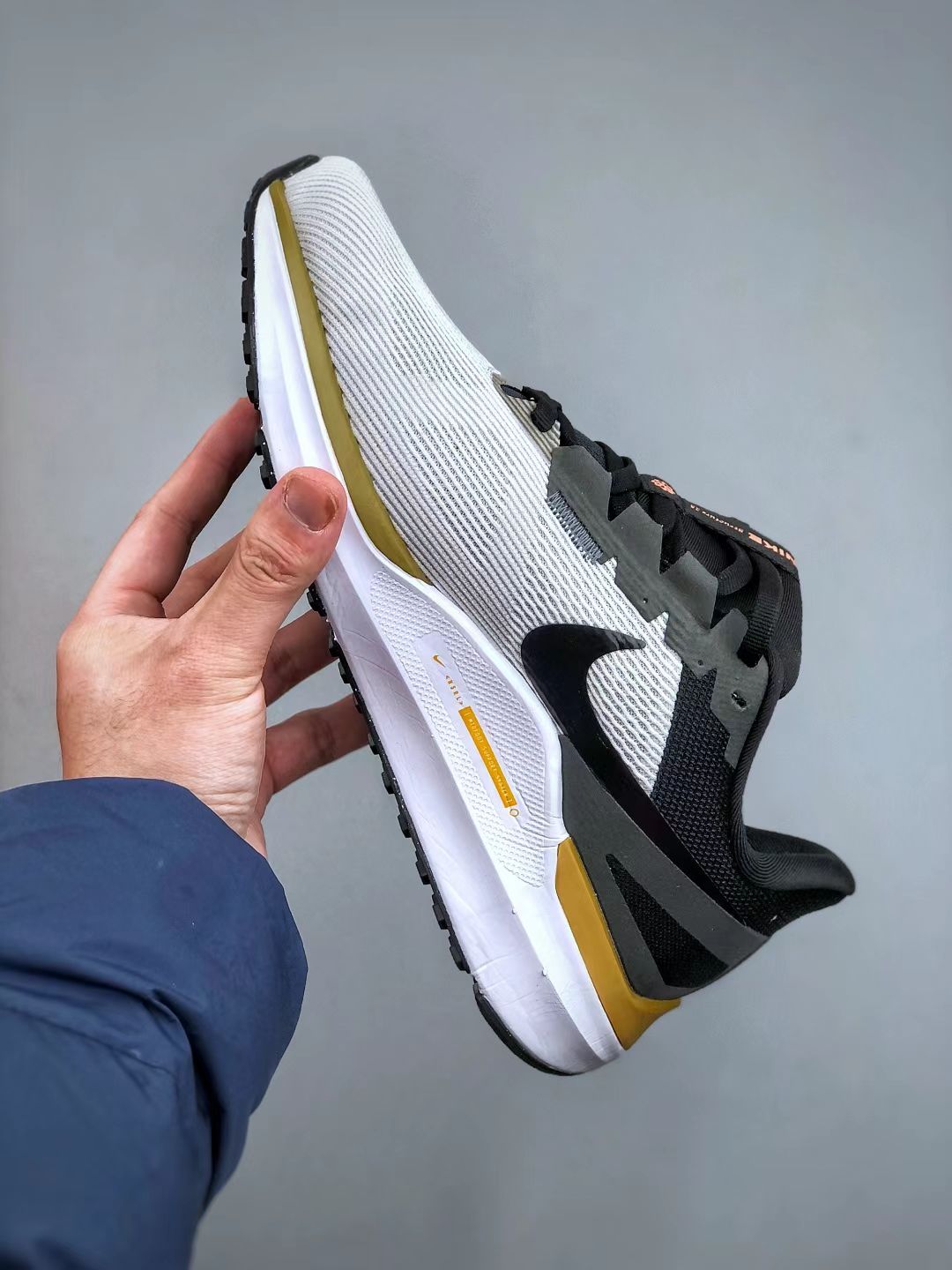 Nike Structure 25 in White/Yellow/Black: Architectural Guidance