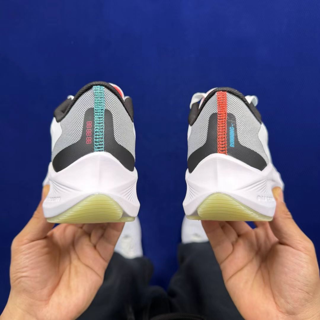 Nike Zoom Winflo in White/Cyan/Red: Kinetic Aura