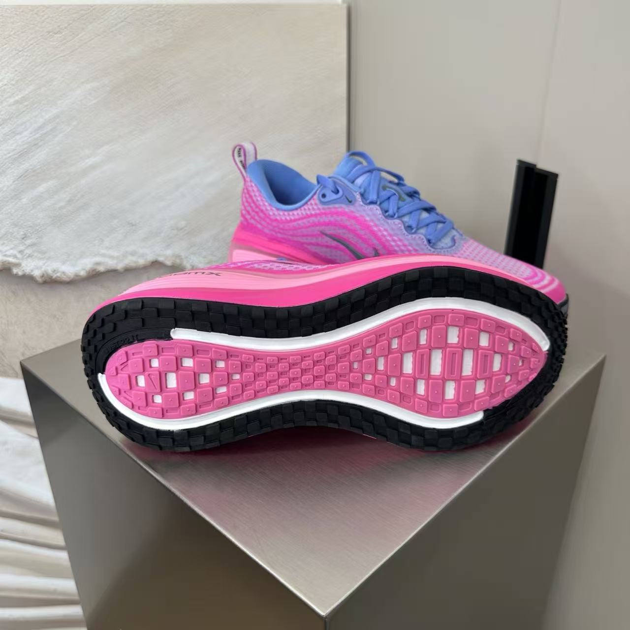 Nike Zoom Vomero in Pink/Purple: Chromatic Bloom