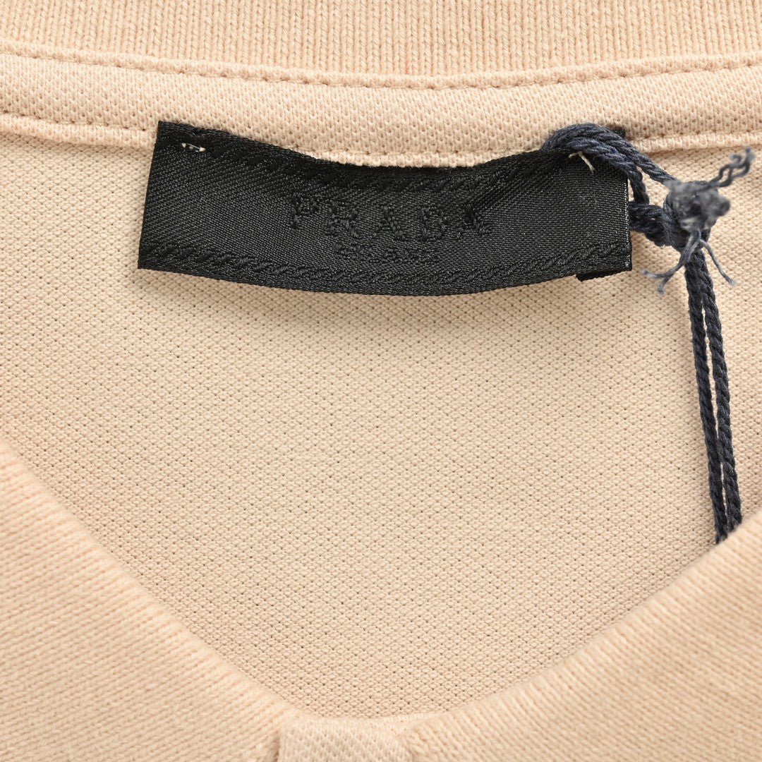 Pra*a beige polo shirt