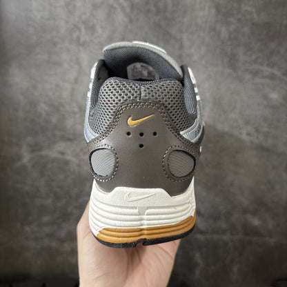 Nike P-6000 “Black/Grey/Orange” – Retro Runner with a Pop
