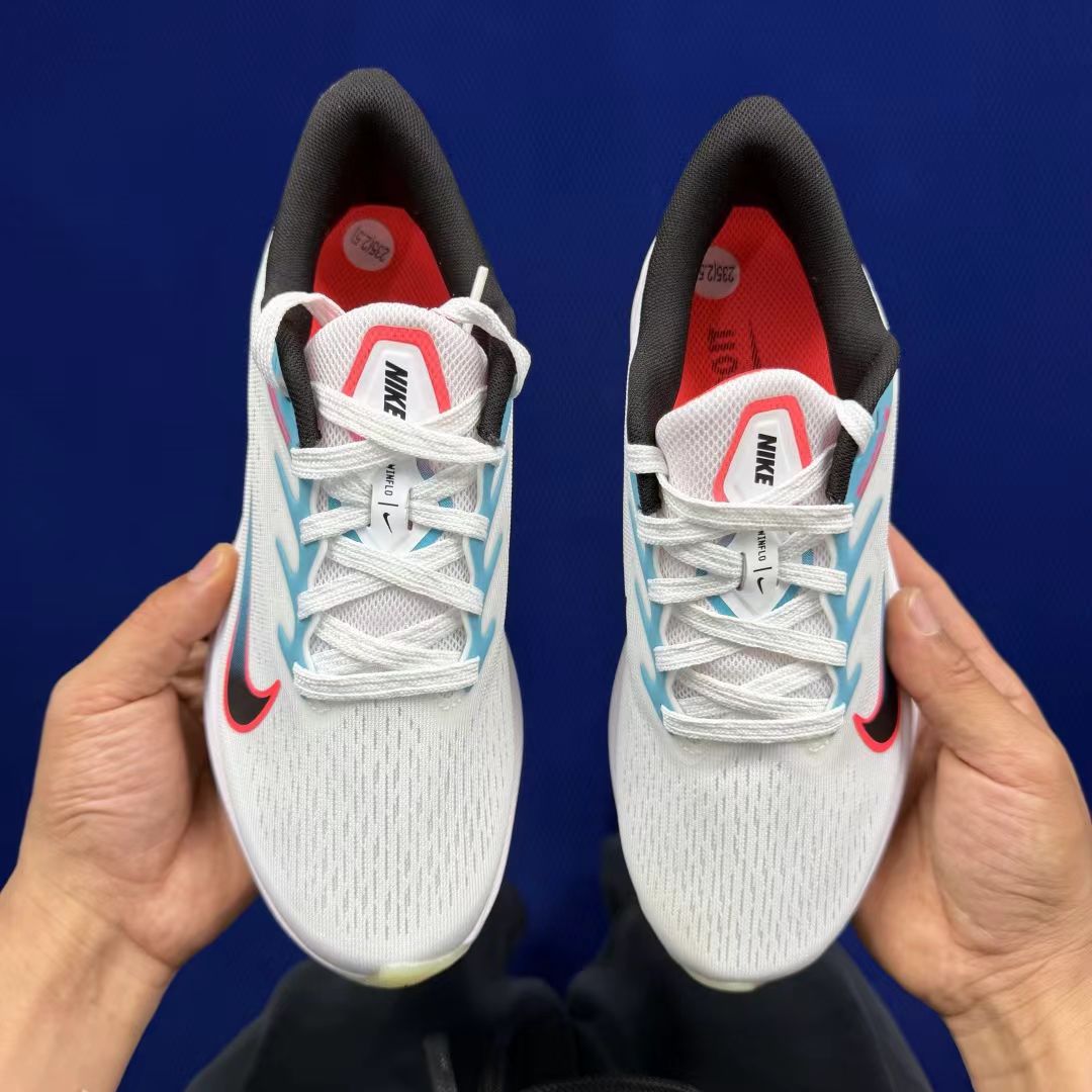 Nike Zoom Winflo in White/Cyan/Red: Kinetic Aura