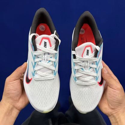 Nike Zoom Winflo in White/Cyan/Red: Kinetic Aura