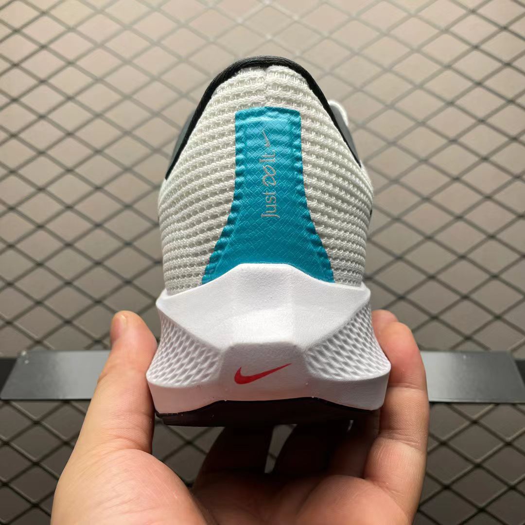 Nike Zoom Pegasus in White/Red/Blue: Tri-Color Velocity