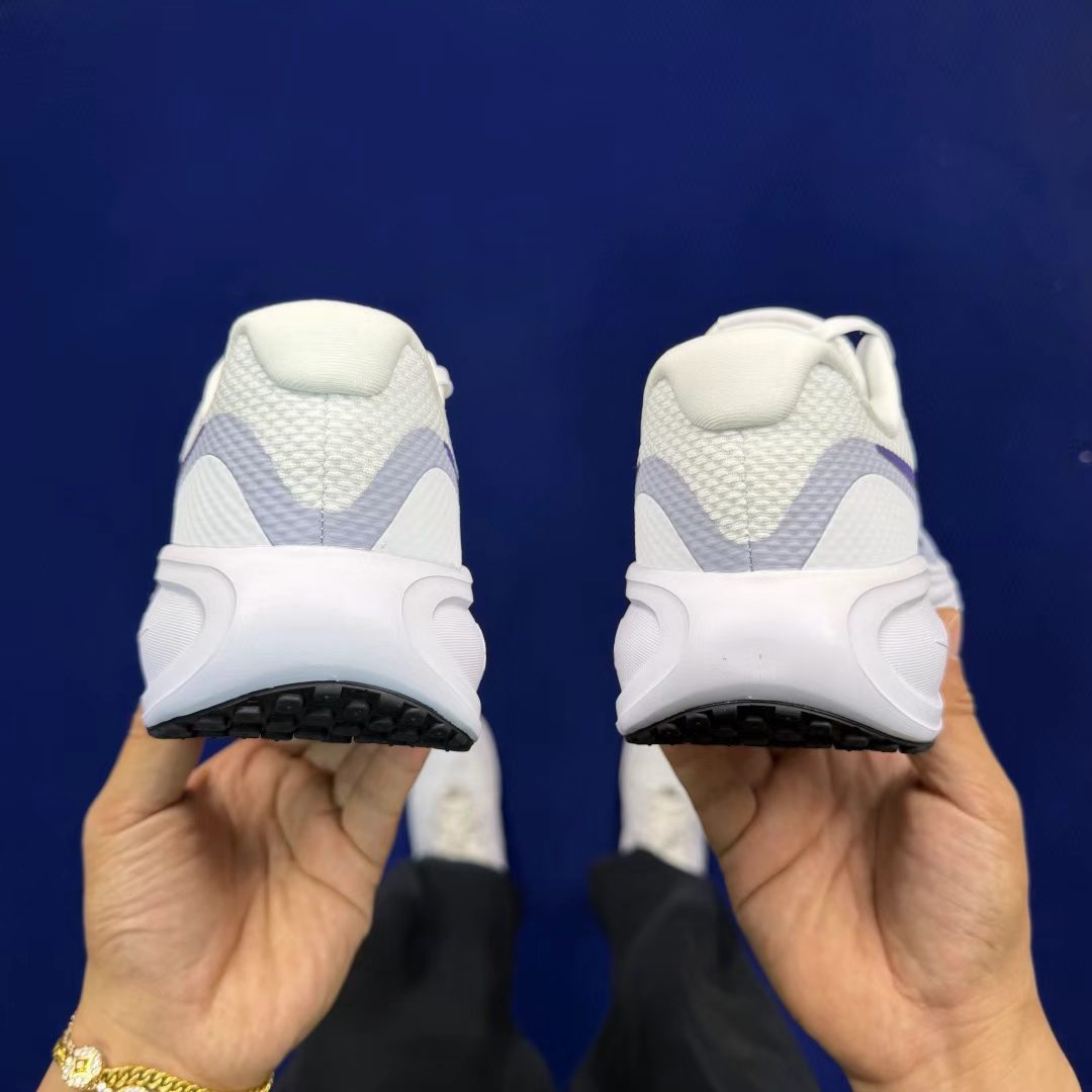 Nike Revolution in White/Lavender: Ethereal Momentum