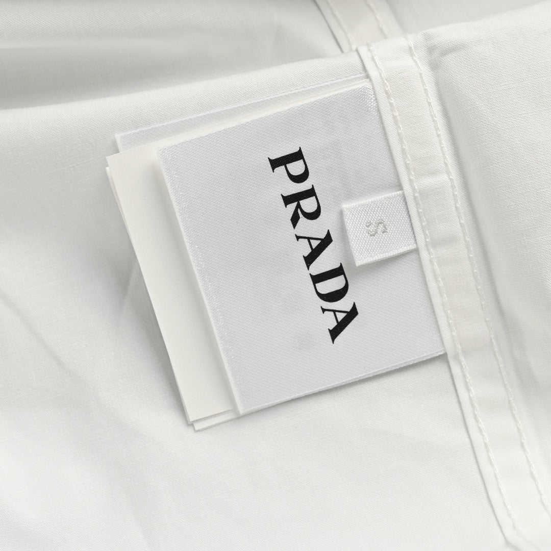 Pra*a short-sleeve button-up shirt (white)