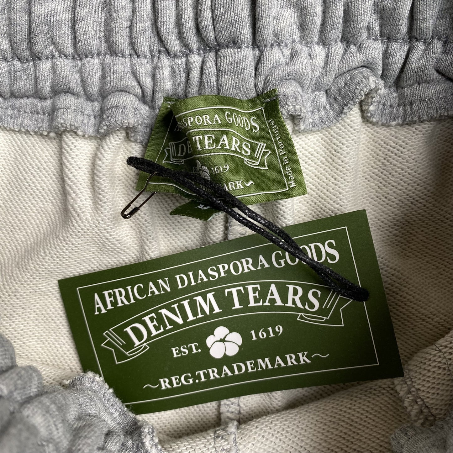 DENIM TEARS COTTON WREATH SWEATPANTS GREY - Prime Reps