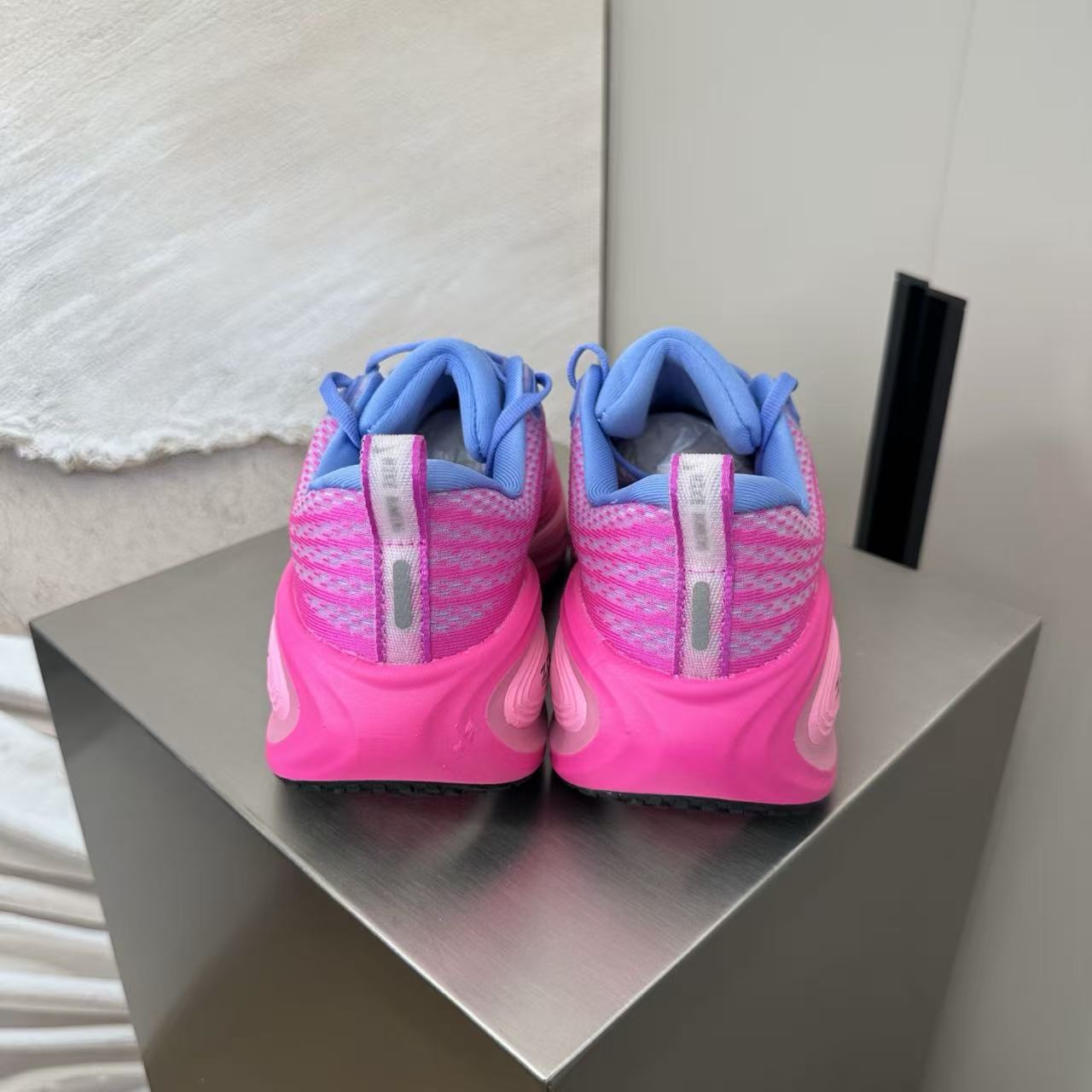 Nike Zoom Vomero in Pink/Purple: Chromatic Bloom