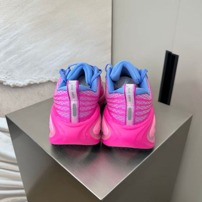 Nike Zoom Vomero in Pink/Purple: Chromatic Bloom